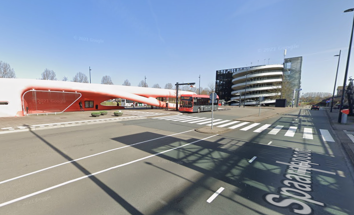 Parking garage entrance and bus stop at Spaarnepoort 2 Hoofddorp showing direct shuttle connection to MASCOT Circuit Zandvoort for the F1 Dutch Grand Prix 2026