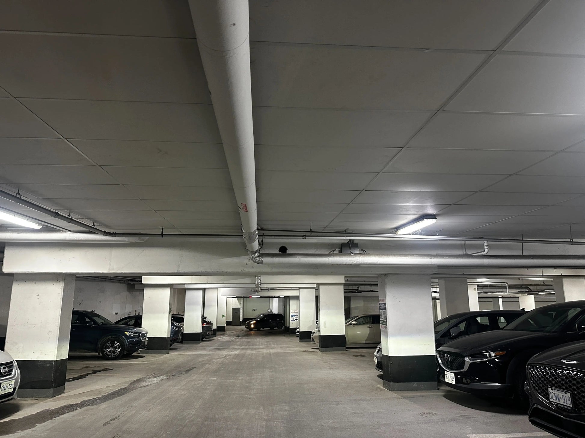 Indoor covered parking garage at 5 Hanna Ave Toronto for World Cup 2026 BMO Field parking showing available spaces and height restriction